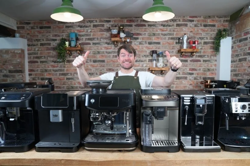 Sleek black coffee maker with a glass carafe on a modern kitchen counter